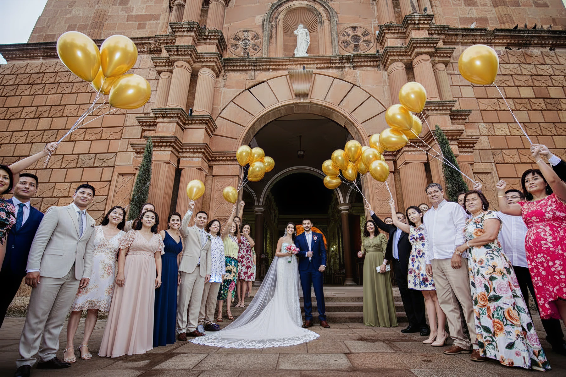 Cropped photo of the exterior of the top floor of an old stone building.